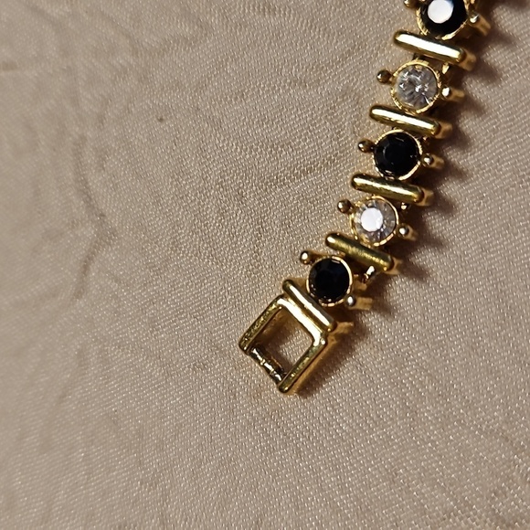 NAPIER Vintage Rhinestones, Black Stones, and Gold Tone Tennis Bracelet - Picture 5 of 10